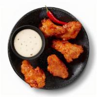 Snack Size Old Bay Hot Sauce Wings · This wing recipe marries our traditional breaded wing with Old Bay Hot Sauce. It's our hotte...