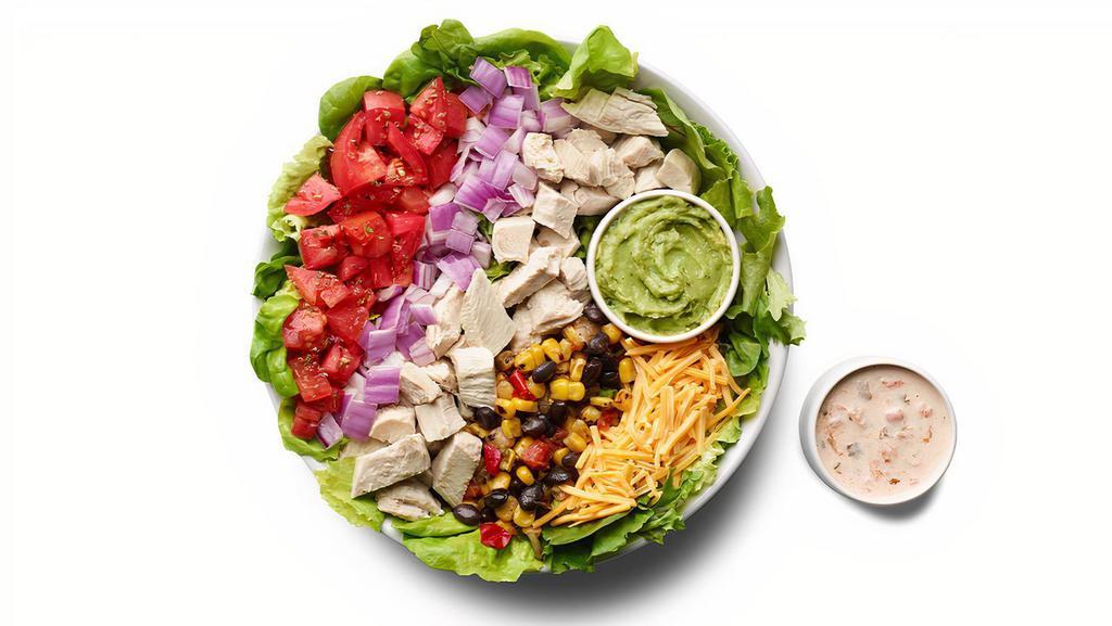 Southwest Chicken Taco Salad · Green Leaf, Green Romaine, Baby Spinach, Arugula, Frisee, Grilled Chicken, Cheddar Cheese, Diced Tomatoes, Red Onions, Black Bean and Fire Roasted Corn Medley, Guacamole and Southwest Salsa Ranch Dressing.
