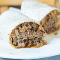 Cheese Steak Wrap · with Green Peppers and Onions.