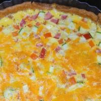 Quiche · served with our creamy grits