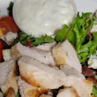 Cobb Salad · Chopped greens, tomato, turkey bacon, boiled eggs, avocado, chicken breast, blue cheese crum...