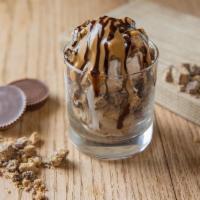 Peanut Butter Bomb · A peanut butter explosion! Peanut butter cup ice cream topped with reeses cups, peanut butte...