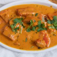 Chicken Tikka Masala · Cubed chicken marinated in tandoori sauce grilled and served in our special creamy sauce.