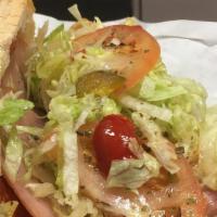 The Deli Chicken Cheese Steak · Provolone cheese, peppers, onions, lettuce, tomatoes and mayonnaise