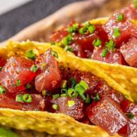 Tuna Taquitos · Gluten free. Sushi Grade Ahi, Avocado, and Wasabi.

Consuming raw or undercooked meat,
seafo...