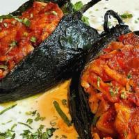 Chile Relleno · Gluten free. 

Consuming raw or undercooked meat,
seafood or eggs may increase risk of foodb...