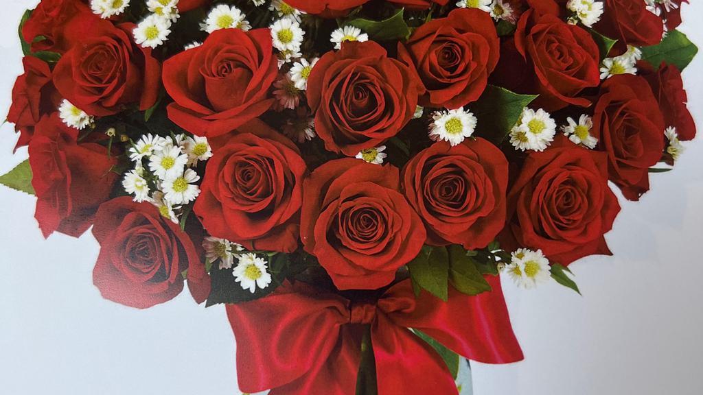 Mother’S Day Rose Deluxe · Beautiful Arrangement 3 Fresh Dozens of Roses with Beautiful Daisies  includes a box of Chocolates 

Roses color may vary