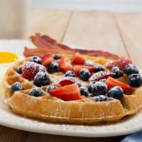 The Patriot Waffle · Belgian Waffle Topped with Fresh Blueberries, Strawberries, & Bananas.