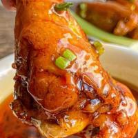 Voodoo Wings · House made spiced wings made with jalapenos and hot sauce.