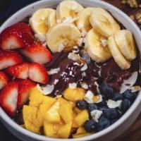 Acai Bowl · Our ACAI BOWL is topped with banana slices, strawberries, blueberries , mango, coconut, gran...