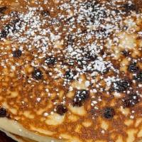 Buttermilk Pancakes · Hot and fluffy buttermilk pancakes grilled to a golden brown topped with butter and maple sy...