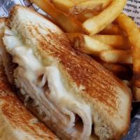 Turkey & Brie Grilled Cheese · White bread, roasted turkey, brie cheese,  fig spread
