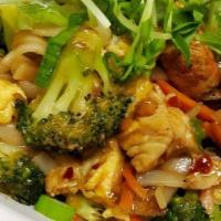Chicken Pad Thai Noodle Bowl · Chicken, diced scrambled egg, carrots, broccoli, over a bed of rice noodles tossed with a sp...