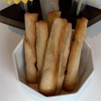 Lumpia & Banana Ketchup · Filipino baked savory spring roll.