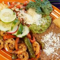 Fajitas · Choice of meat, with colorful sauteed bell peppers and onions. Comes with guacamole, sour cr...