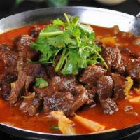 Beef Hot Pot辣牛肉火锅 · Beef, cabbage, potato, fried tofu, bean sprout with our chef's special hot pot soup