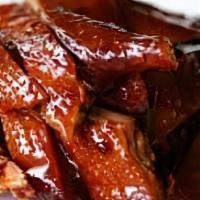 Shanghai Braised Duck酱鸭 · It is a special dish of shanghai it has a thick soy sauce color a bright oily texture and a ...