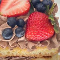Fruit  Cake · sponge cake with fresh fruit, vanilla flavored whipped cream filling