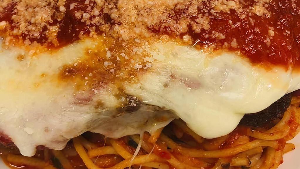 Chicken Parmesan Spaghetti · Home-breaded, marinara, spaghetti, parmesan.