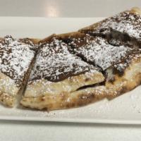 Calzone Alla Nutella · Baked turnover pizza dough with nutella.