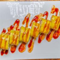 Mango Shrimp Roll · Shrimp tempura, crabmeat, cucumber in soybean wrap, topped with fresh mango & special sauce.