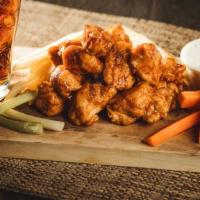 Honey Bbq Wings · Perfect party wings with tasty honey BBQ sauce. Comes with celery and bleu cheese.