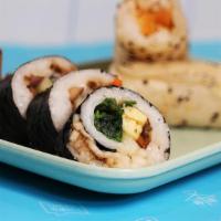 Vegan Futomaki · Four pieces of big roll with vegan tamago egg, glazed 