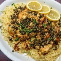 Chicken Francese · Dipped in Egg Batter with Capers & Garlic In a White Wine Lemon Sauce.