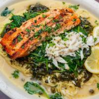 Salmon Della Casa · Grilled Salmon, Sautéed Spinach & Crab Meat with Lemon Garlic Capers Sauce over Pasta.