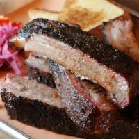 1 Lb Pork Ribs · 1 pound (approximately 4-6 ribs depending on size) served with texas toast and pickles, dry ...