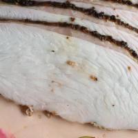 1/2 Lbs Turkey Breast · Smoked daily, served with Texas Toast and pickles.
