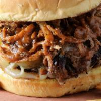 The Big Cheese Sandwich · Chopped pork Or Chopped Brisket melted cheese, crispy onions, bbq sauce