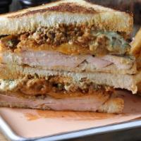 The Jive Turkey · Smoked turkey, melted cheese, crispy onions, buttermilk ranch, bbq sauce