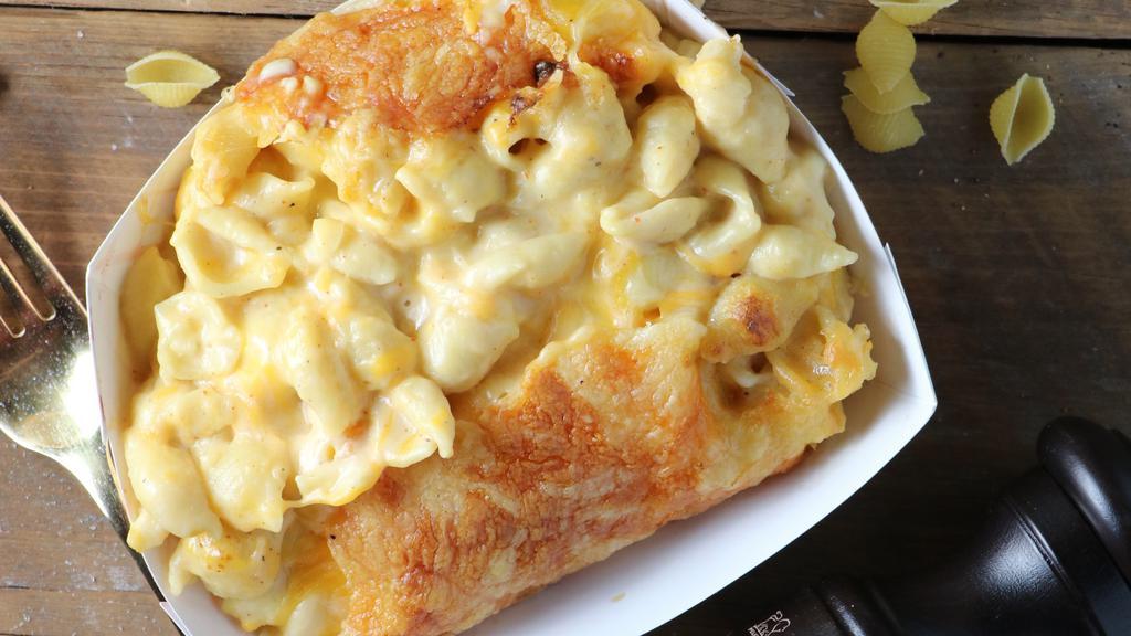 Mac & Cheese · Shell pasta baked with smoked cheddar and jack cheese
