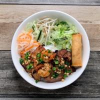 Main Street Special Platters · Grilled chicken, pork, shrimp, and a crispy spring rolls served with vegetables.