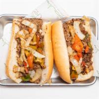 Steak Bomb  · Shaved steak and American cheese w/ grilled mushrooms, peppers, &onions Served on your choic...