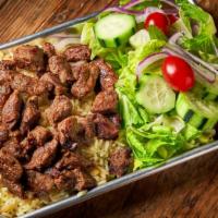 Steak Tip Dinner · With rice pilaf & garden salad. Steak tips are cooked medium-well without exception.