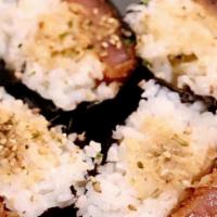 Spam Katsu Musubi · Panko crusted spam with rice wrapped with nori topped with furikake and housemade ginger sca...