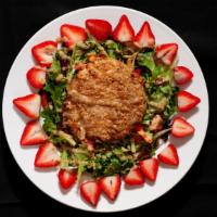 Baked Walnut & Honey Goat Cheese Salad · Gluten-free Item. Warm honey & walnut crusted goat cheese over top a bed of fresh spring mix...