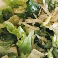 Romaine Heart Caesar Salad · Hearts of Romaine lettuce topped with Tuscan Caesar dressing, garlic croutons, anchovy fille...