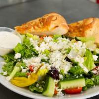 Greek · Garden salad, feta cheese, and Greek dressing.