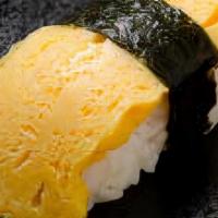 Tamago (Egg Omelet) · Nigiri - 2pc - Sweetened Egg Omelette over Rice
Sashimi - 3pc - Just Sweetened Egg Omelette