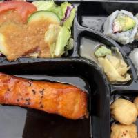 Salmon Teriyaki · Served with house salad white rice 3 pieces of california roll and 3 pieces of shumai.