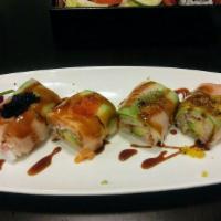 New Rainbow Maki · Spicy. Eel & avocado inside, topped with tuna, yellowtail, salmon, tobiko, spicy mayo wrappe...