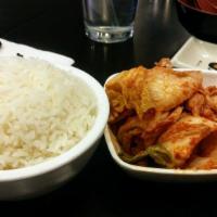 Kimchi Jiigae · Spicy. Tofu, kimchi, onion, sliced pork, mushroom and watercress.