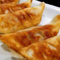 Gyoza · Pork and vegetable dumpling with house special sauce (pan-fried or steamed). ***please note ...