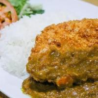Chicken Cutlet Curry · Lightly breaded chicken cutlet served Japanese curry over rice with side of pickle relish an...