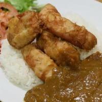 Karaage Chicken Curry · Lightly battered ginger marinated boneless chicken and Japanese curry served over rice with ...