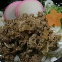 Beef Udon · Fish broth and udon topped with marinated sliced beef, caramelized onion, seasonal veggie, f...