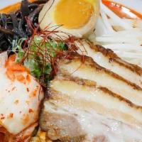 Spicy Ramen · Natural Heritage Berkshire Pork bone soup (tonkotsu) with chicken and seafood broth with wav...
